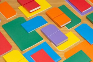 blue yellow red and green papers